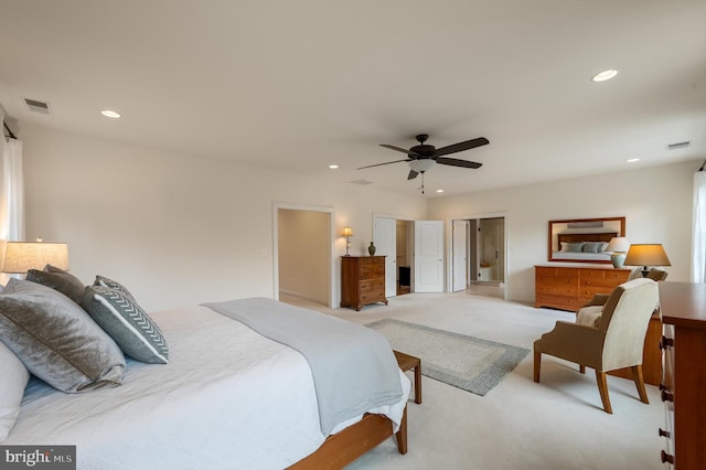 bedroom with ceiling fan, recessed lighting, visible vents, and light carpet