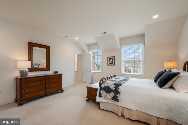 bedroom with recessed lighting, visible vents, and carpet