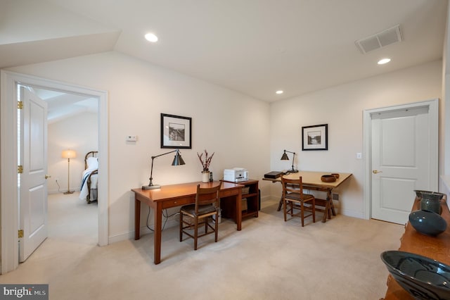 home office featuring visible vents, recessed lighting, baseboards, light colored carpet, and vaulted ceiling