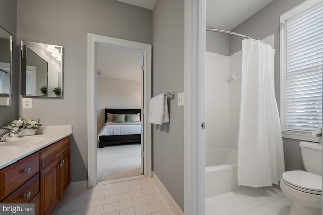 bathroom with tile patterned flooring, baseboards, toilet, shower / tub combo, and vanity