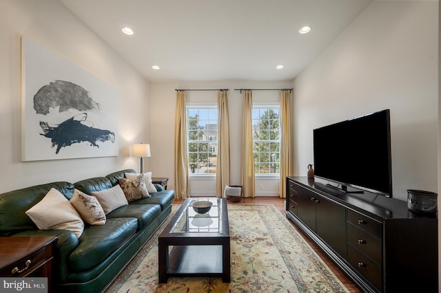 living room featuring recessed lighting and light wood-style flooring