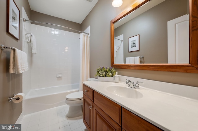 bathroom with vanity, toilet, shower / bath combo with shower curtain, and tile patterned flooring