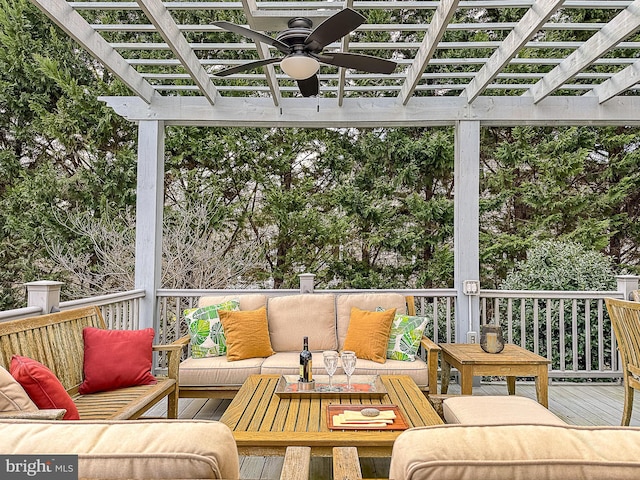 exterior space featuring a ceiling fan, a pergola, and an outdoor hangout area