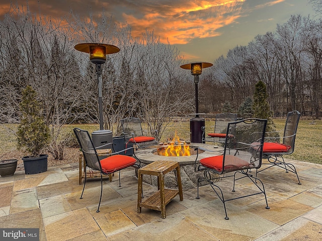 view of patio / terrace featuring a fire pit