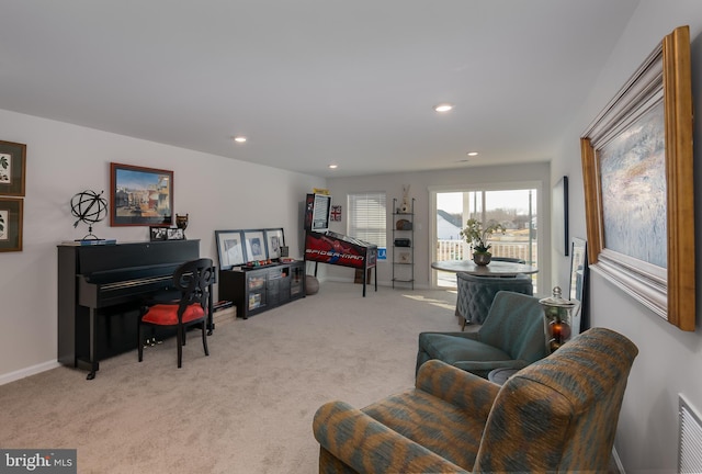 carpeted living room featuring recessed lighting and baseboards