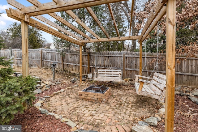 view of yard featuring a patio, a fire pit, a fenced backyard, and a pergola