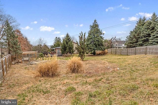 view of yard with fence