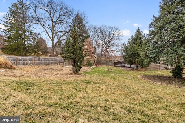 view of yard featuring a fenced backyard