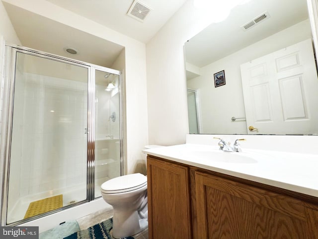 full bath with a shower stall, visible vents, toilet, and vanity