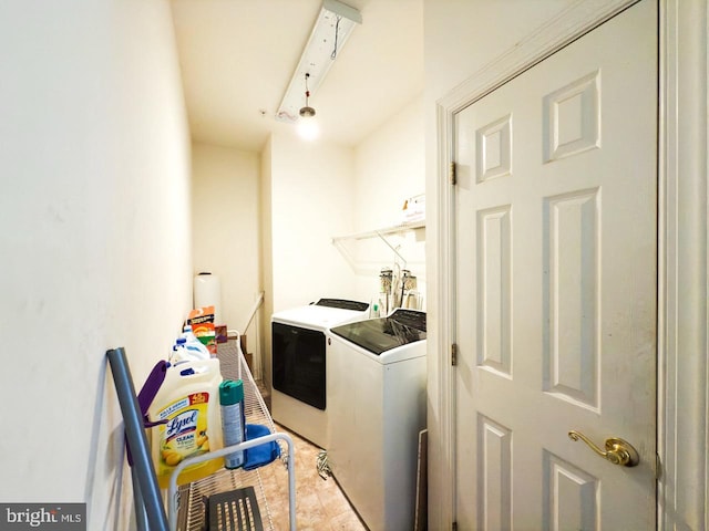 laundry area with independent washer and dryer and laundry area