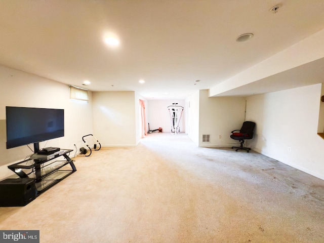 living area featuring baseboards, recessed lighting, visible vents, and carpet