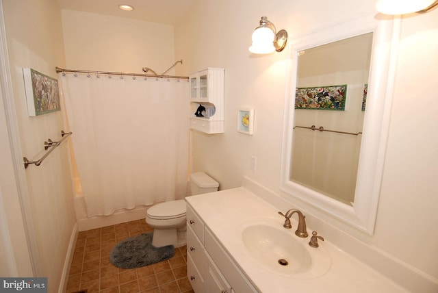 bathroom with vanity, recessed lighting, tile patterned flooring, shower / tub combo, and toilet