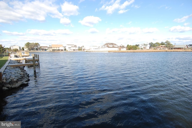 property view of water featuring a boat dock