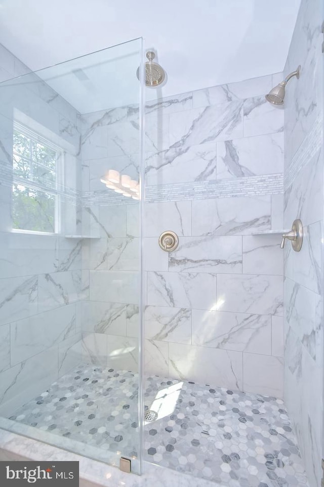 full bath featuring a stall shower