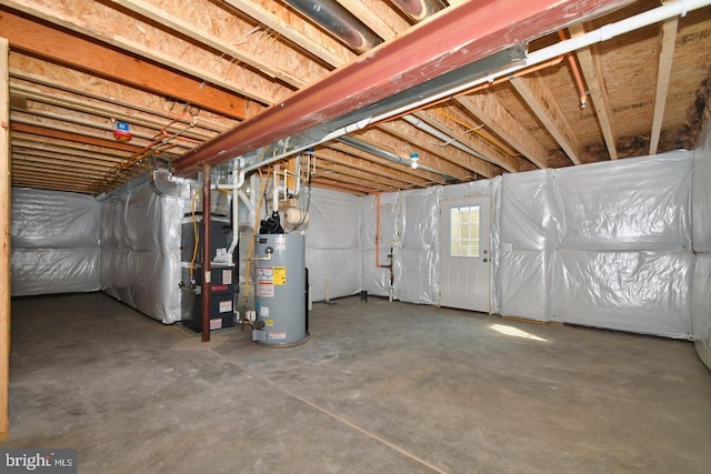 basement with gas water heater and heating unit