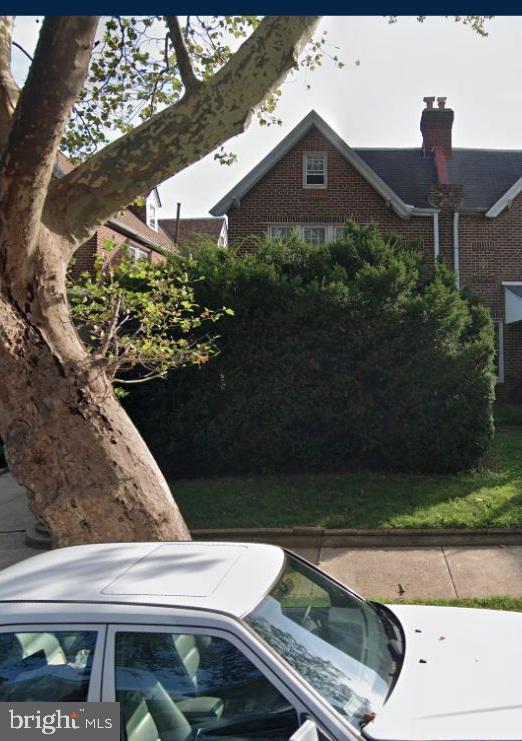 view of home's exterior with brick siding