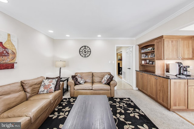 living area featuring crown molding, recessed lighting, and light colored carpet