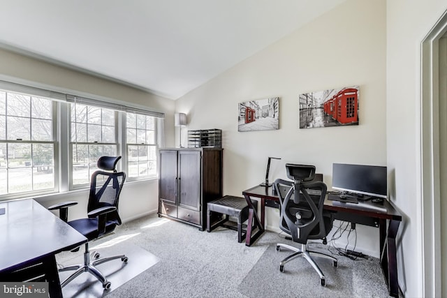 office featuring carpet flooring and vaulted ceiling