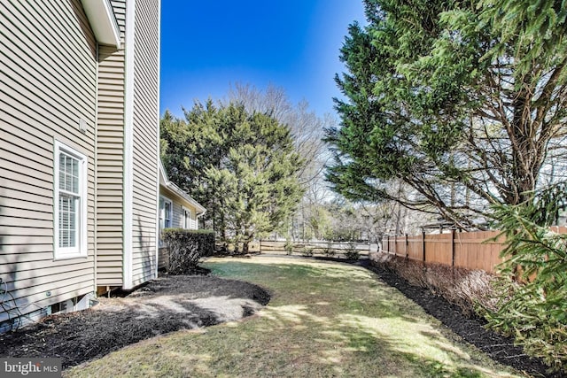 view of yard featuring a fenced backyard