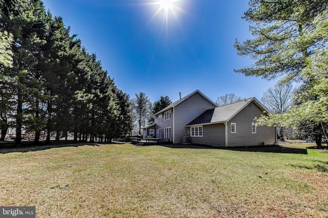 exterior space featuring a deck and central AC unit