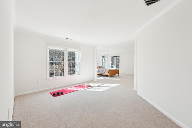 playroom featuring visible vents, crown molding, baseboards, and carpet floors