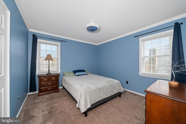 bedroom featuring carpet flooring, crown molding, and baseboards