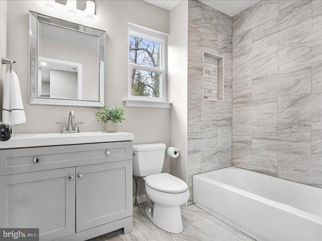 full bathroom with vanity and toilet