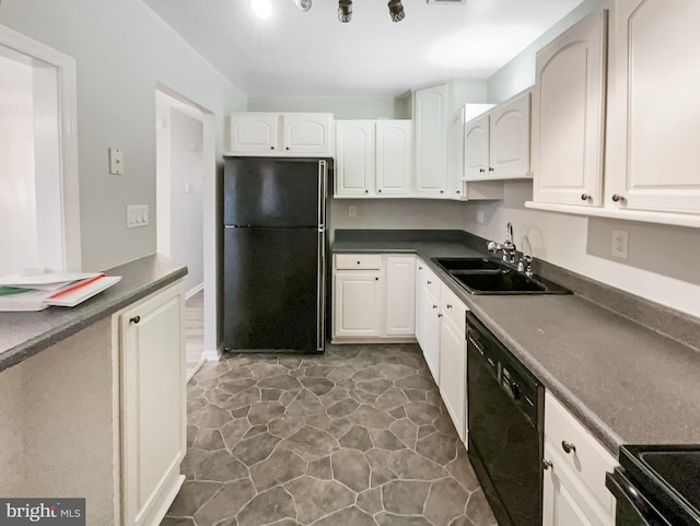 kitchen featuring black appliances, white cabinets, dark countertops, and a sink