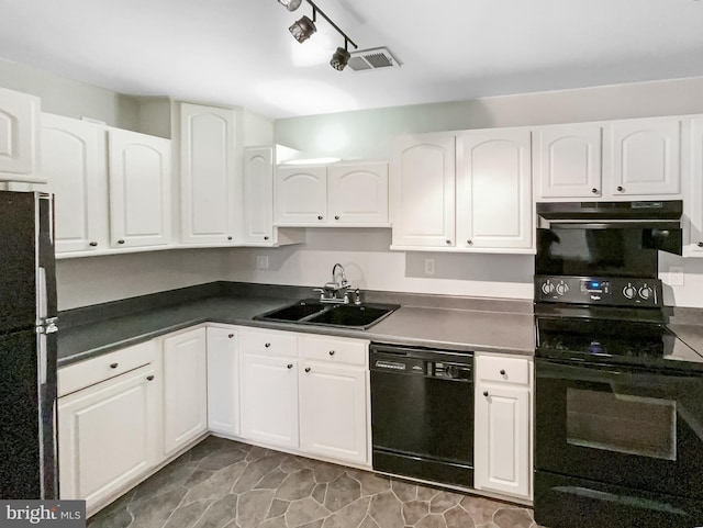 kitchen featuring visible vents, a sink, black appliances, under cabinet range hood, and white cabinetry