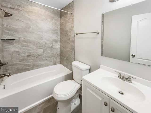 full bath with vanity, toilet, and  shower combination