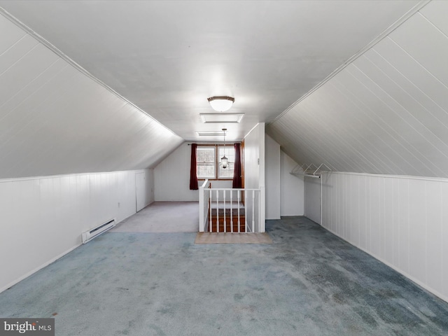 bonus room featuring vaulted ceiling, carpet flooring, and baseboard heating