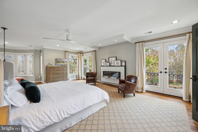 bedroom featuring visible vents, ornamental molding, french doors, and access to outside