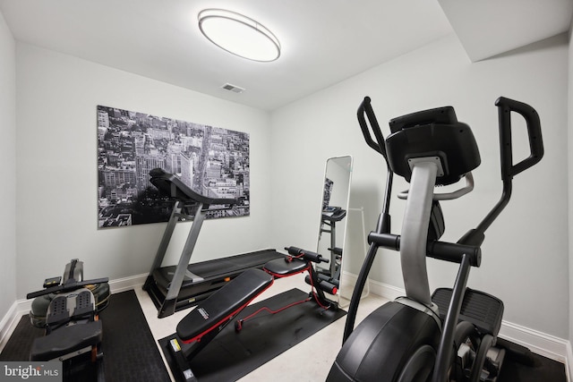 workout room with baseboards and visible vents