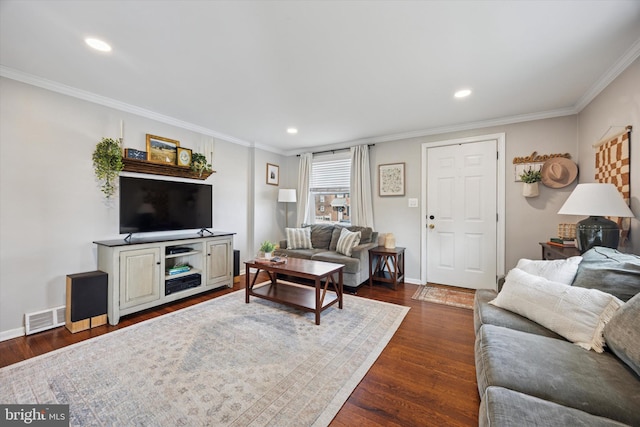 living area with visible vents, baseboards, ornamental molding, recessed lighting, and dark wood-style flooring