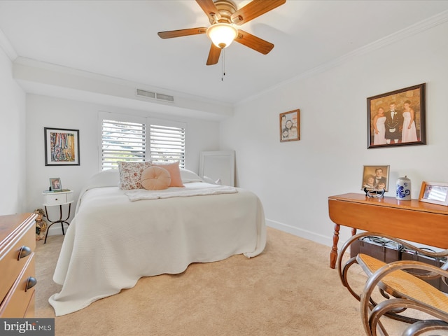 bedroom featuring visible vents, crown molding, baseboards, light colored carpet, and ceiling fan