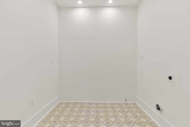 laundry room with laundry area, recessed lighting, hookup for an electric dryer, and baseboards