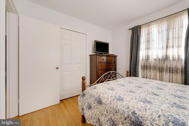 bedroom featuring light wood-style floors