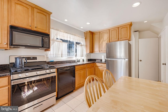 kitchen with light brown cabinets, light tile patterned floors, recessed lighting, black appliances, and a sink