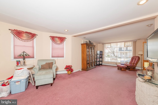 living area with a baseboard heating unit, recessed lighting, carpet flooring, a baseboard radiator, and baseboards