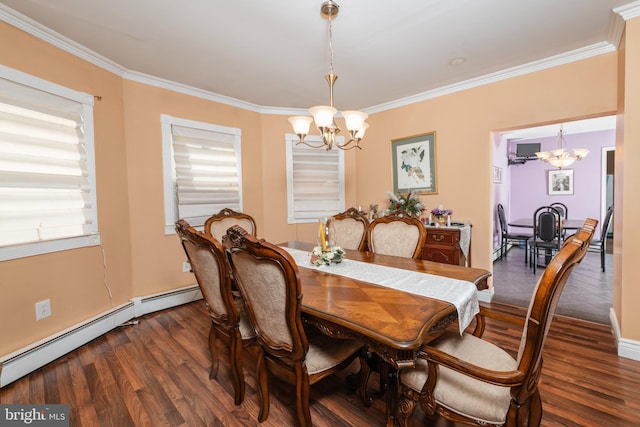 dining area featuring a notable chandelier, wood finished floors, and crown molding