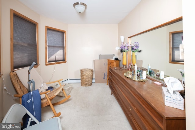 interior space with a baseboard radiator and carpet flooring