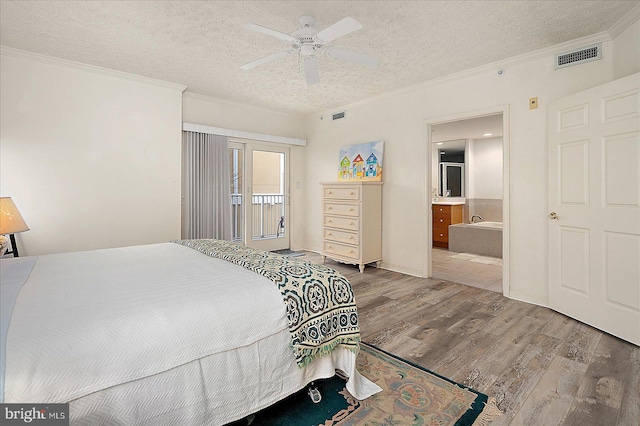 bedroom with visible vents, ornamental molding, access to outside, a textured ceiling, and wood finished floors