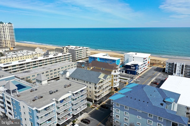 aerial view with a beach view and a water view