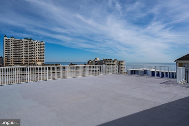 view of patio featuring a water view