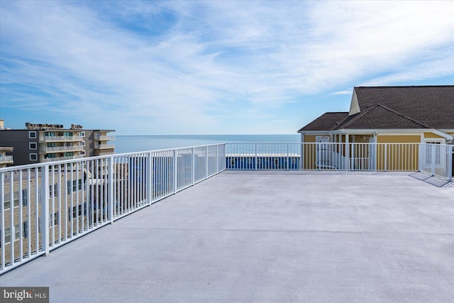 view of patio featuring a water view