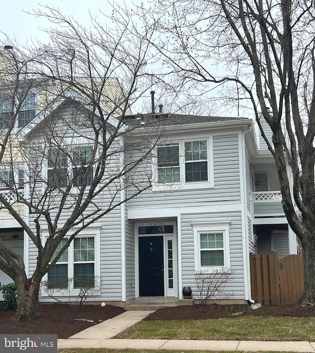 view of front of property with fence