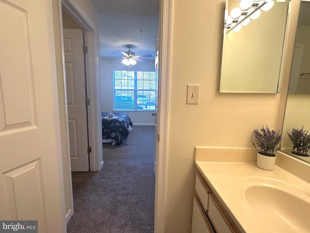 bathroom featuring vanity and ceiling fan