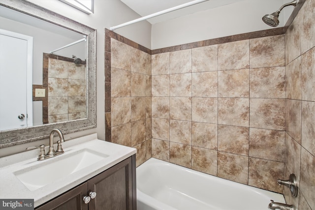 bathroom with shower / washtub combination and vanity