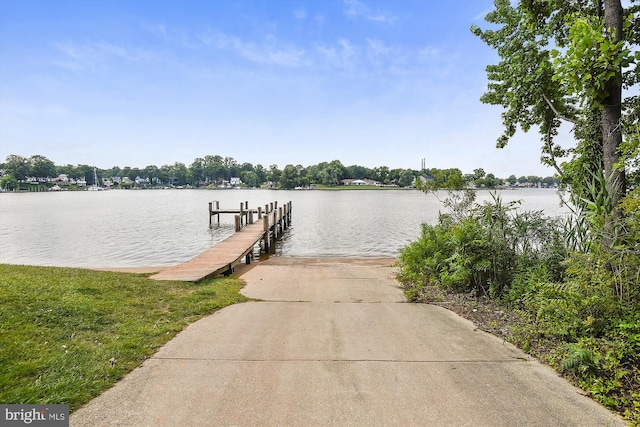 dock area featuring a water view