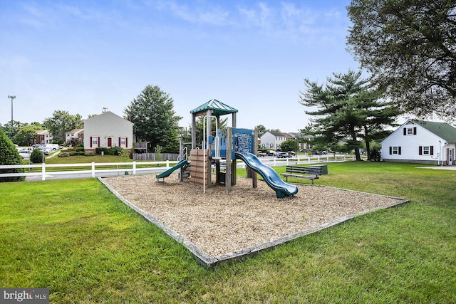 communal playground with a lawn